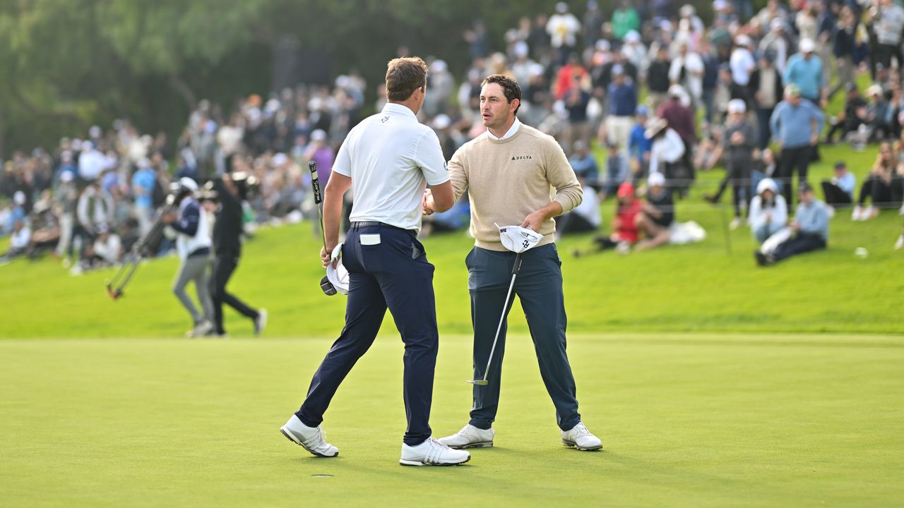 Patrick Cantlay shakes hands with Luke List on the 18th green at Riviera Country Club