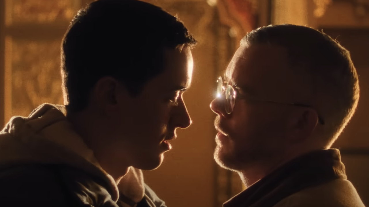 Tom Blyth and Russell Tovey facing each other in Plainclothes