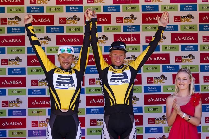 Karl Platt and Urs Huber of Bulls in the overall leaders' jerseys
