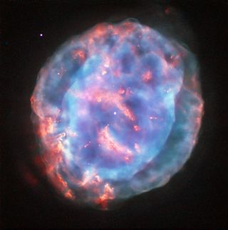 Planetary nebulas have rounded, shell-like shapes. An example is NGC 6818, also known as the Little Gem Nebula, seen in this image.