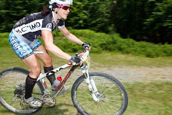 Open Women's GC Leader Selene Yeager (Team CF) rides with a smile