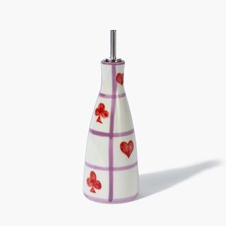 Vaisselle oily pourer with checkered print.