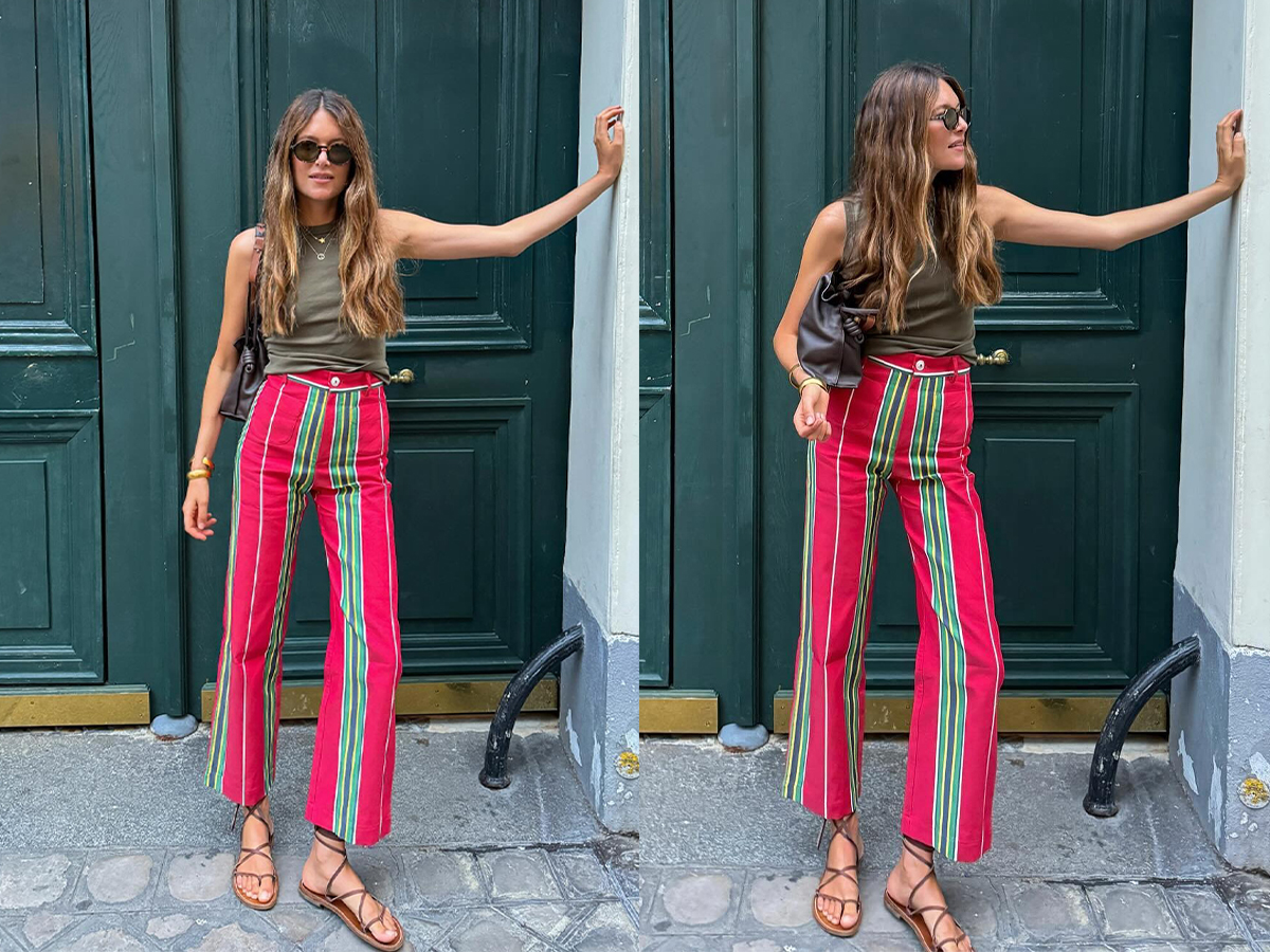 Influencer Sara Ramén wears La Veste red striped pants with a green tank in Paris.