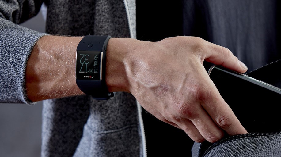 Polar M600 Wear OS smartwatch worn on a wrist.
