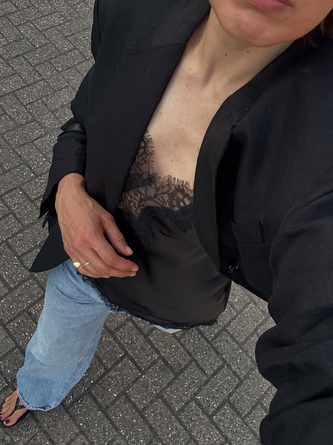 woman wearing black lace going out top outfit fall 2025
