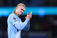Erling Haaland applauds travelling Leeds fans at the Etihad Stadium earlier this season