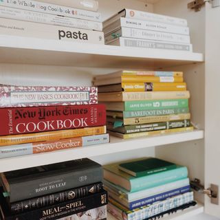 Cook books organized in small apartment