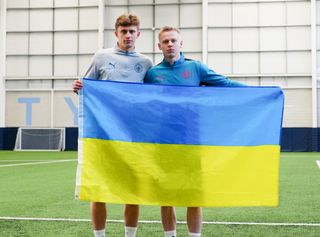 Zinchenko (right) also fixed up for friend and fellow player Andrii Kravchuk (left) to train with City