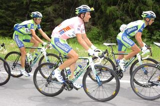 Maglia Rosa Ivan Basso (Liquigas-Doimo) in the peloton