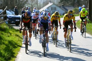 HARELBEKE BELGIUM MARCH 25 LR Wout Van Aert of Belgium and Team Jumbo Visma Kasper Asgreen of Denmark and Team QuickStep Alpha Vinyl and Christophe Laporte of France and Team Jumbo Visma compete during the 65th E3 Saxo Bank Classic 2022 a 2039km one day race from Harelbeke to Harelbeke E3SaxobankClassic WorldTour on March 25 2022 in Harelbeke Belgium Photo by Tim de WaeleGetty Images