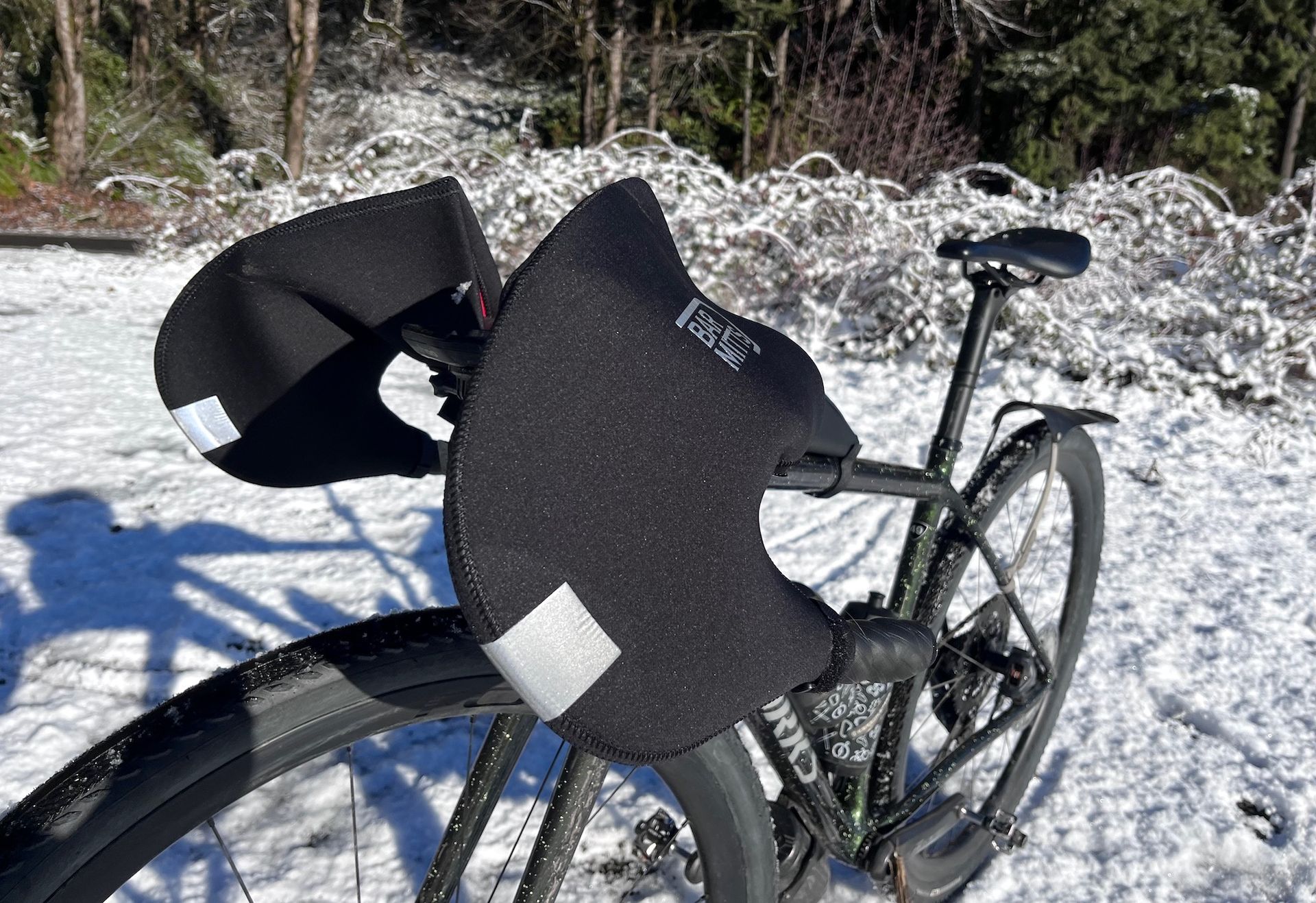 Image shows the Bar Mitts attached to a bike