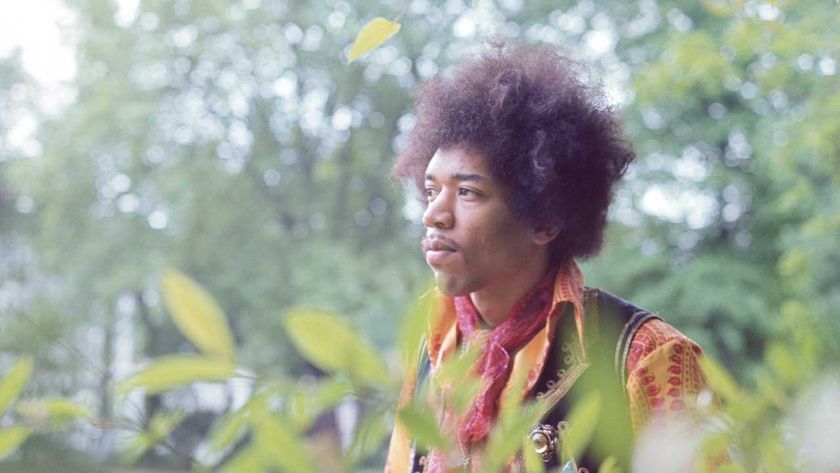 Jimi Hendrix posting in a hotel garden, 1967