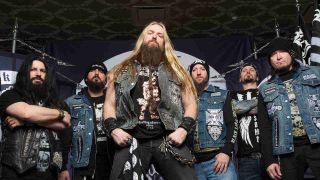 Black Label Society posing for a photograph in 2013