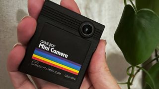 Game Boy Mini Camera cartridge in the hand