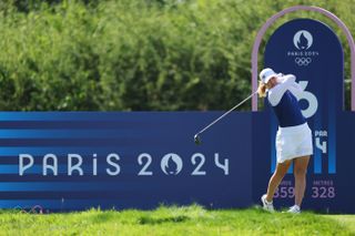 Celine Borge hits a tee shot at the Olympics