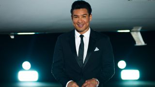 Mario Lopez in a tux for Too Hot to Handle season 4