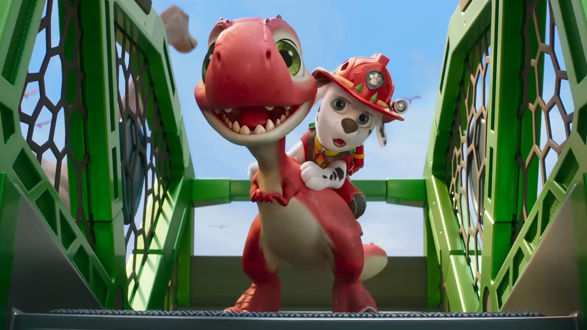 Marshall is shown riding a dinosaur in the trailer for Paw Patrol: The Dino Movie.