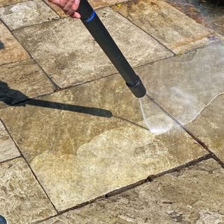 Pressure washing the patio with the Nilfisk excellent 160-10 pressure washer