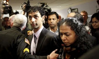 Dharun Ravi is escorted out of the courthouse Friday after being found guilty of committing hate crimes against his late roommate Tyler Clementi.