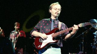 Guitarist Walter Becker performs with Steely Dan at the Great Woods Center for the Performing Arts in Mansfield, MA on Aug. 20, 1993