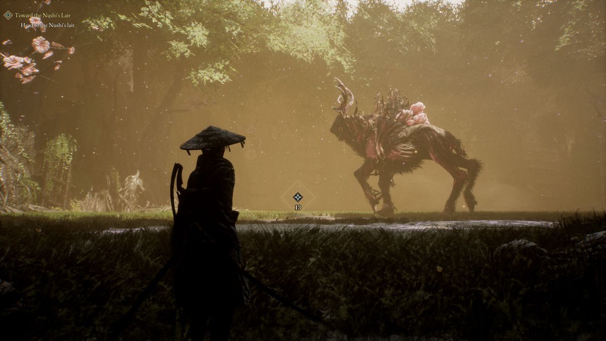 A silhouetted figure observes a distant beast
