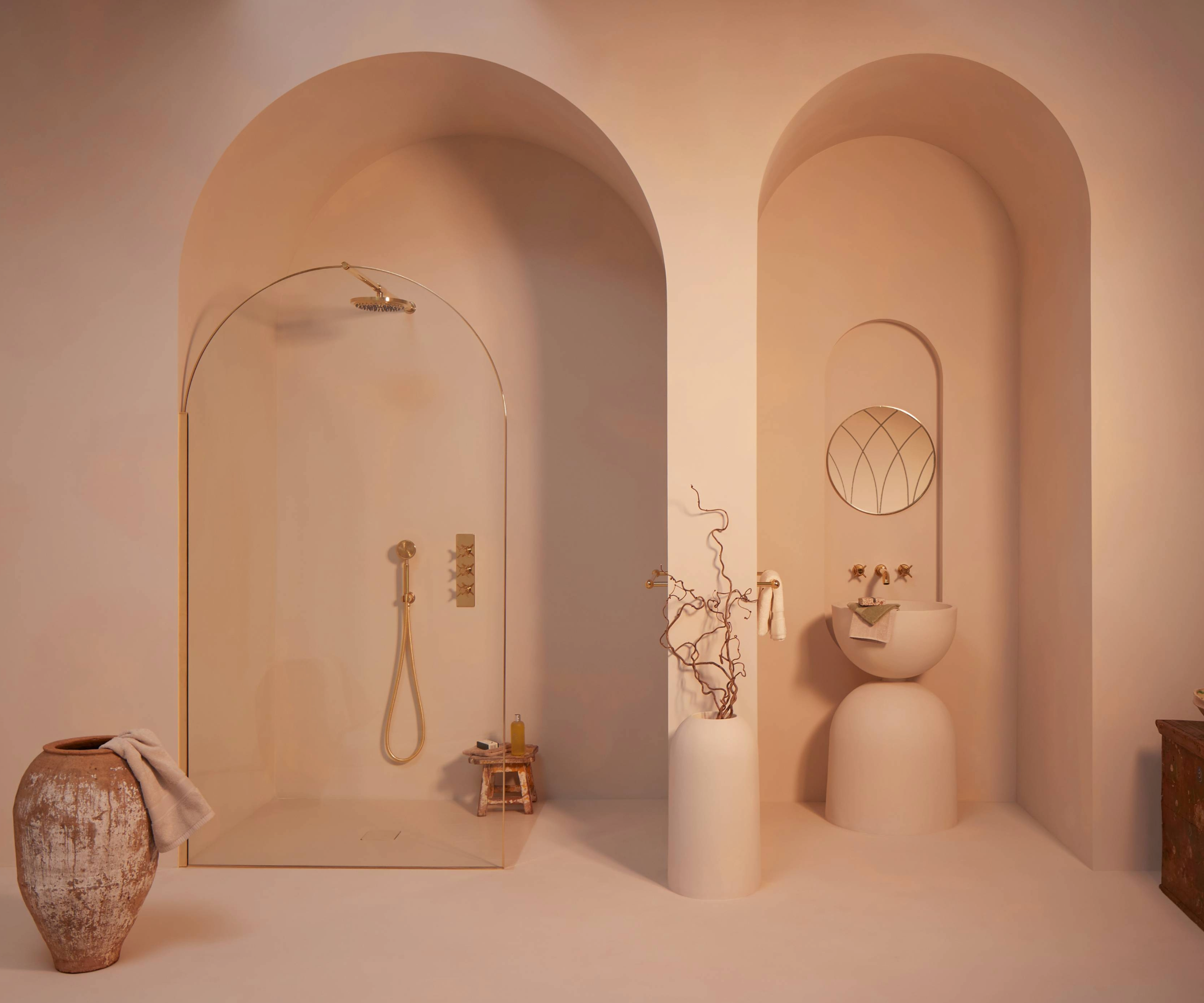 Wet room with curved shower design