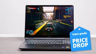 HP Omen Max 16 on table with Cyberpunk 2077 on display with Tom's Guide Price Drop badge