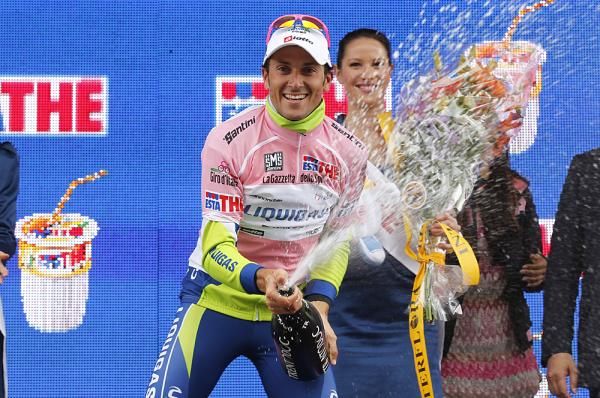 Ivan Basso celebrates his pink jersey at the Giro.
