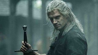 The Witcher TV series — Geralt scowls toward the camera, sword in hand.