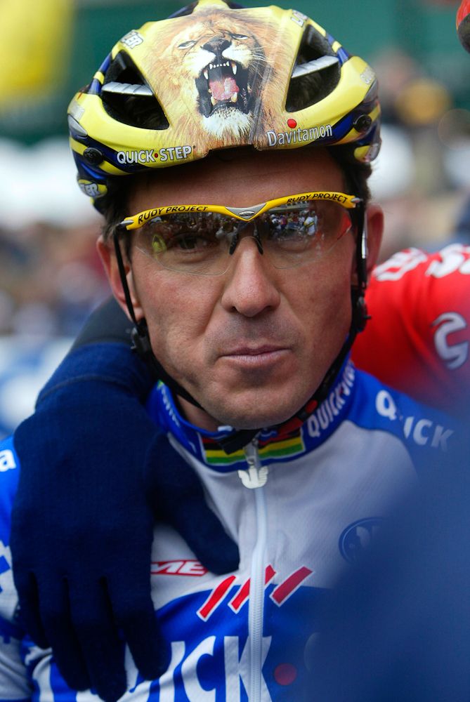 Three-time Flanders winner Johan Museeuw (Quick-Step) sports a Lion of Flanders helmet.