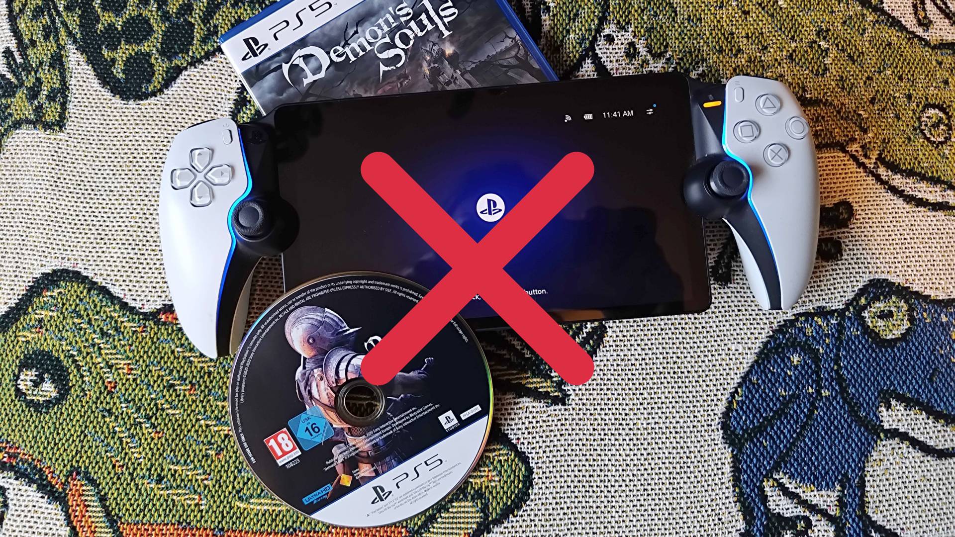 PS Portal next to box and disc for Demon&#039;s Souls with red cross over image.