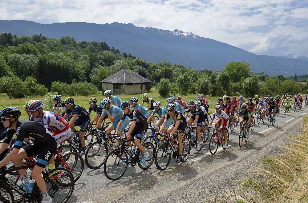 The pack rides during the 131.5 km first stage of the 67th edition of the Criterium Dauphine.