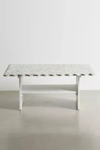 coffee table made out of recycled plastic with wavy edge detail