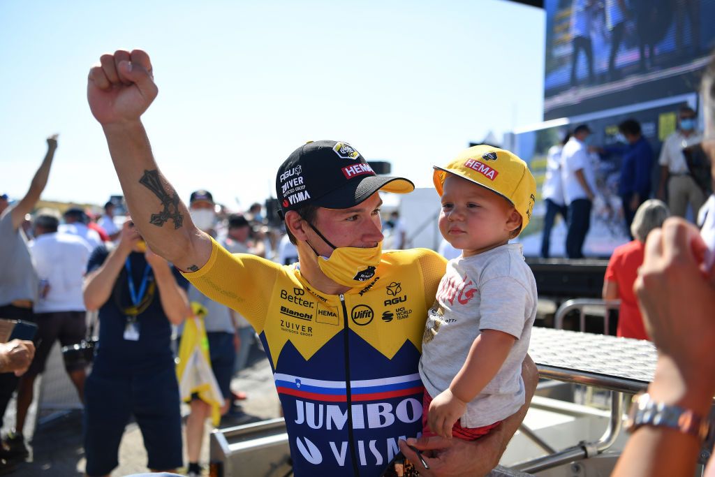 Roglic celebrates with his child