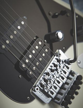 Detail of the Floyd Rose locking vibrato and Habanero Classic humbuckers on a GJ2 Glendora electric guitar