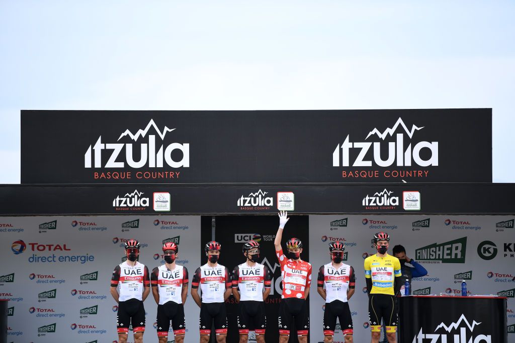 ONDARROA SPAIN APRIL 09 Start Tadej Pogacar of Slovenia Polka Dot Mountain Jersey Brandon Mcnulty of United States Yellow Leader Jersey Valerio Conti of Italy Diego Ulissi of Italy Marc Hirschi of Switzerland Rafal Majka of Poland Jan Polanc of Slovenia and UAE Team Emirates during the 60th ItzuliaVuelta Ciclista Pais Vasco 2021 Stage 5 a 1602km stage from Hondarribia to Ondarroa Mask Covid Safety Measures itzulia ehitzulia on April 09 2021 in Ondarroa Spain Photo by David RamosGetty Images