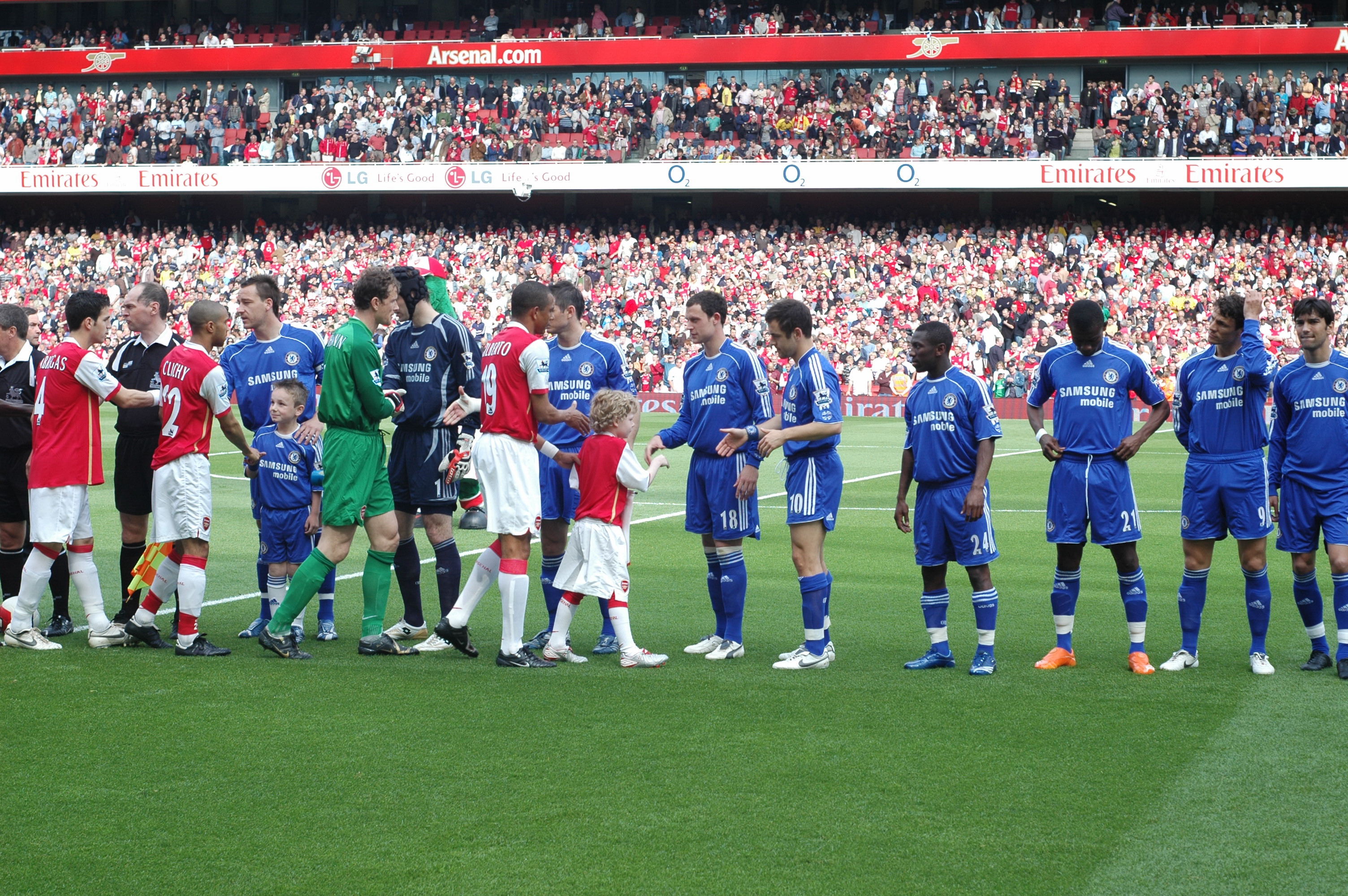 Dundas (C) as a young Gunners mascot
