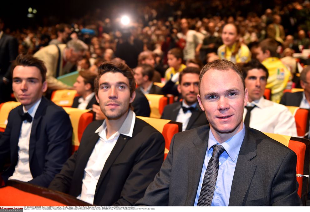 Chris Froome sitting next to Frenchmen Thibaut Pinot and Romain Bardet