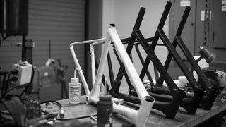 Enve frames on a table being built