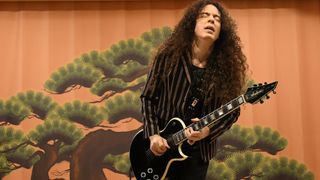 Marty Friedman plays his Jackson signature model for the Japanese Heritage Special at Haneda Airport