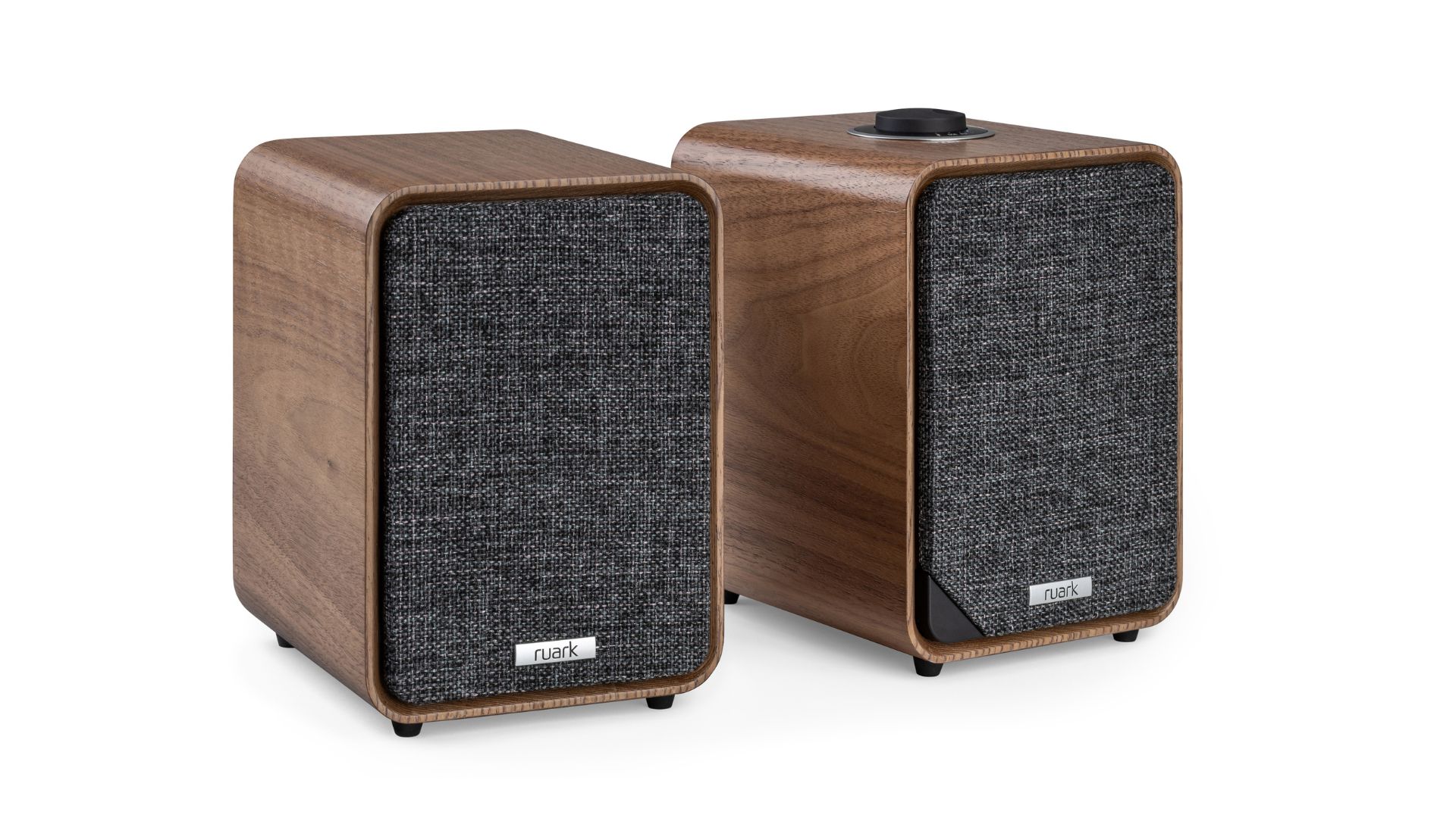 a product shot of the Ruark speakers in walnut against a white background