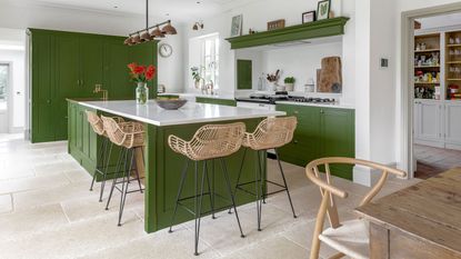 green kitchen Shaker cabinetry kitchen island rattan bar stools