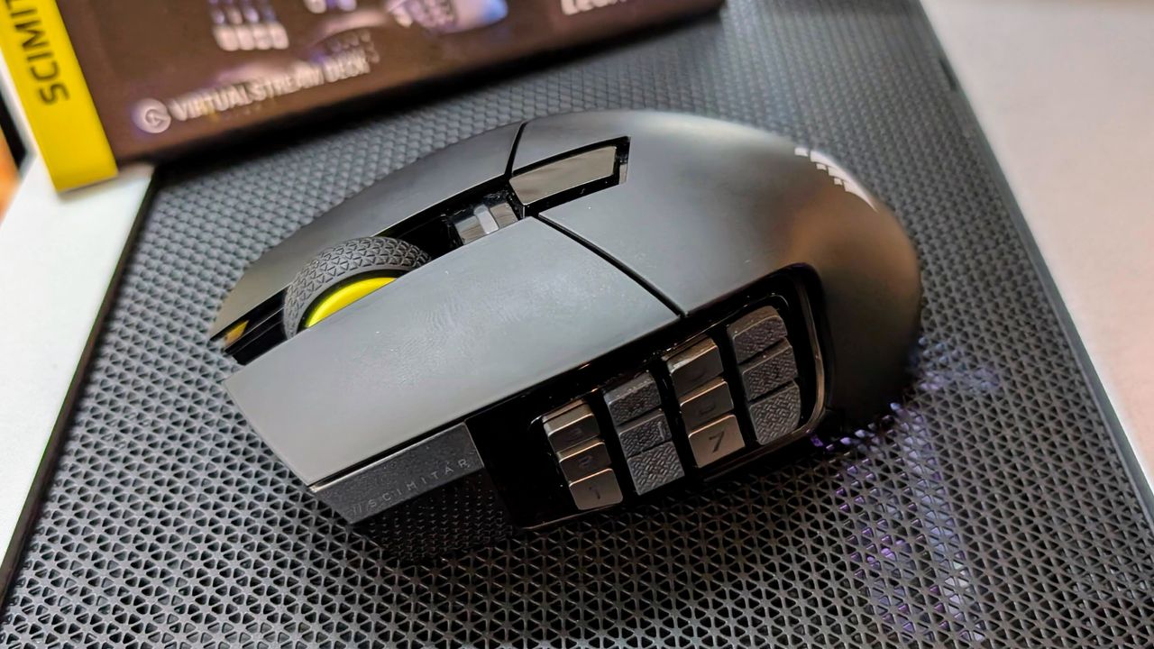 Corsair Scimitar Elite Wireless SE mouse on a mouse pad at Computex 2025