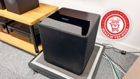 A picture of the KEF Kube 12 MIE with the Deals of the Week logo overlaid
