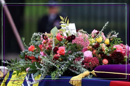 Queen’s funeral flowers - The coffin of Queen Elizabeth II is carried into the Westminster Abbey during her State Funeral on September 19, 2022 in London, England. 