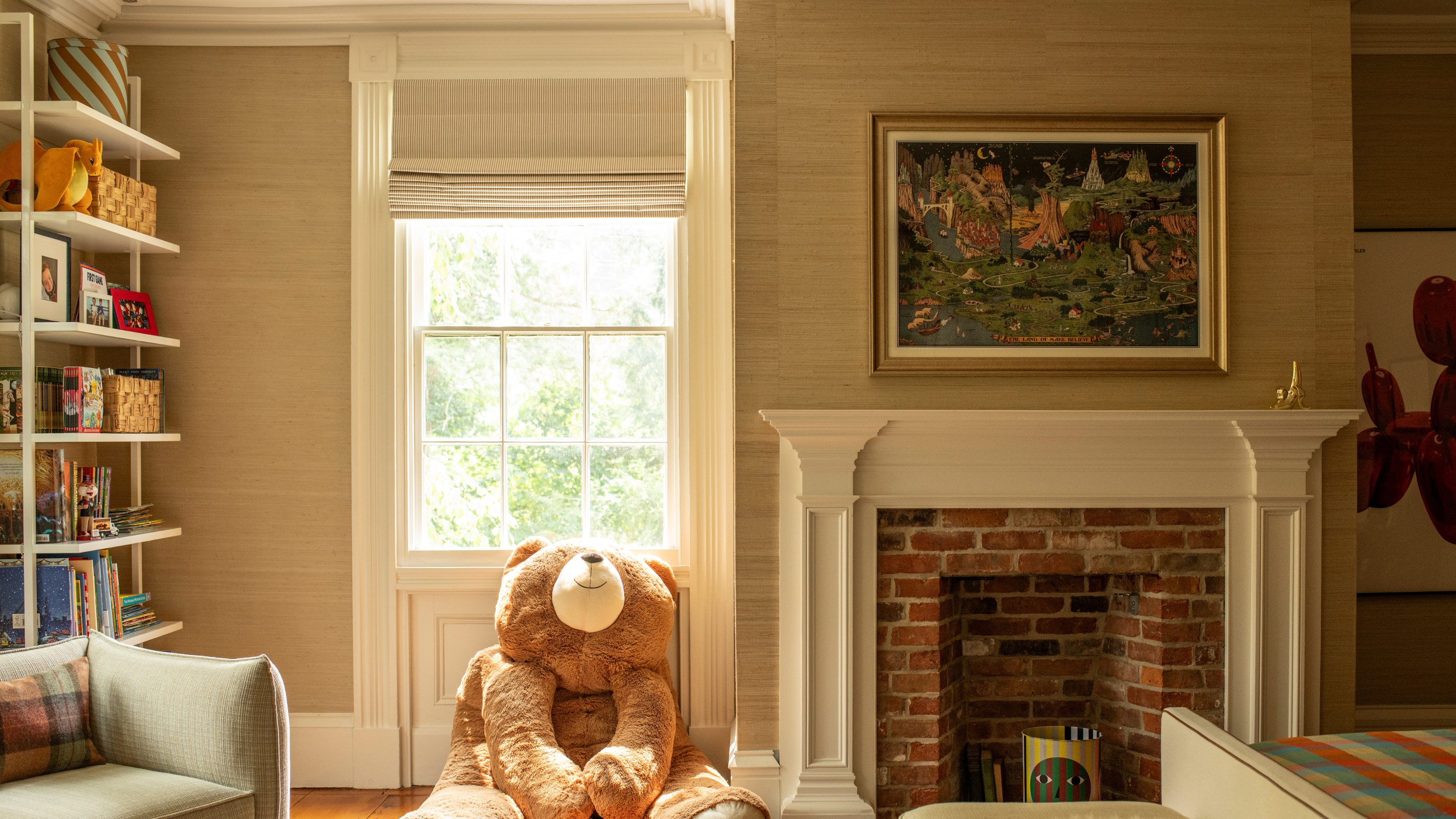 Charming sundrenched children's room featuring a brick fireplace