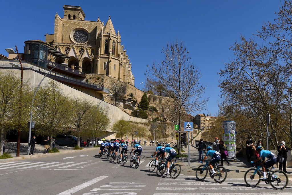 VALLTER 2000 SETCASES VALL CAMPRODON SPAIN MARCH 24 The peloton during the 100th Volta Ciclista a Catalunya 2021 Stage 3 a 2031km stage from Canal Olmpic de Catalunya to Vallter 2000 Setcases Vall Camprodon 2125m Santa Maria De La Seu Church Manresa City Public Fans Landscape VoltaCatalunya100 on March 24 2021 in Vallter 2000 Setcases Vall Camprodon Spain Photo by David RamosGetty Images