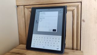 A Kindle Scribe on a table