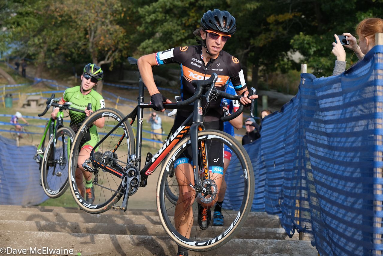 Helen Wyman (Kona) running the longest set of stairs with Emma White trying to hang on.