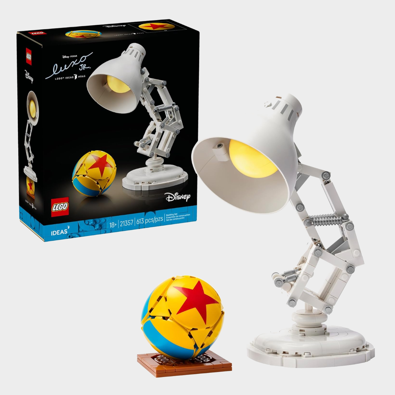 Lego Luxo Jr. set and box on a plain background